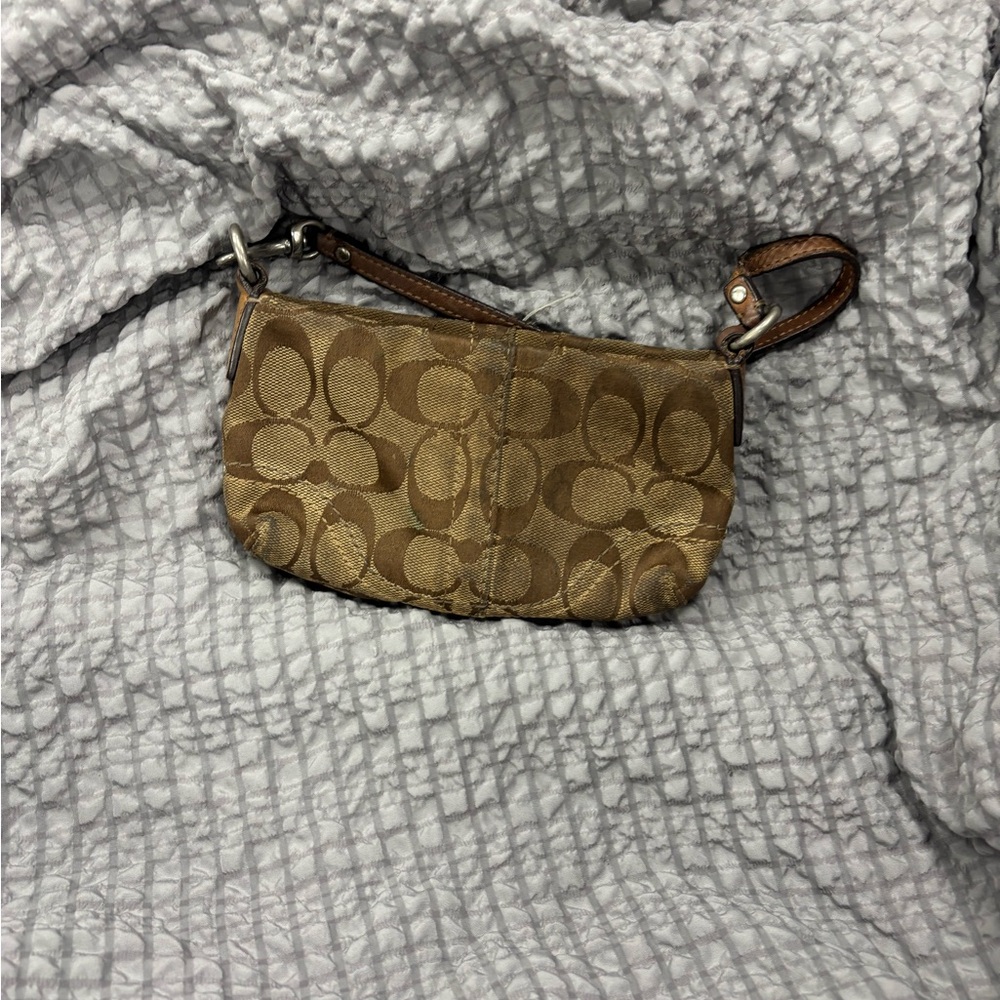 Woman’s Coach Signature Canvas and Leather Wristlet Tan/Brown Bag